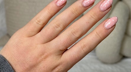 Elegant polka dot manicure at The Nail Spot, Peebles, Scotland, GB.
