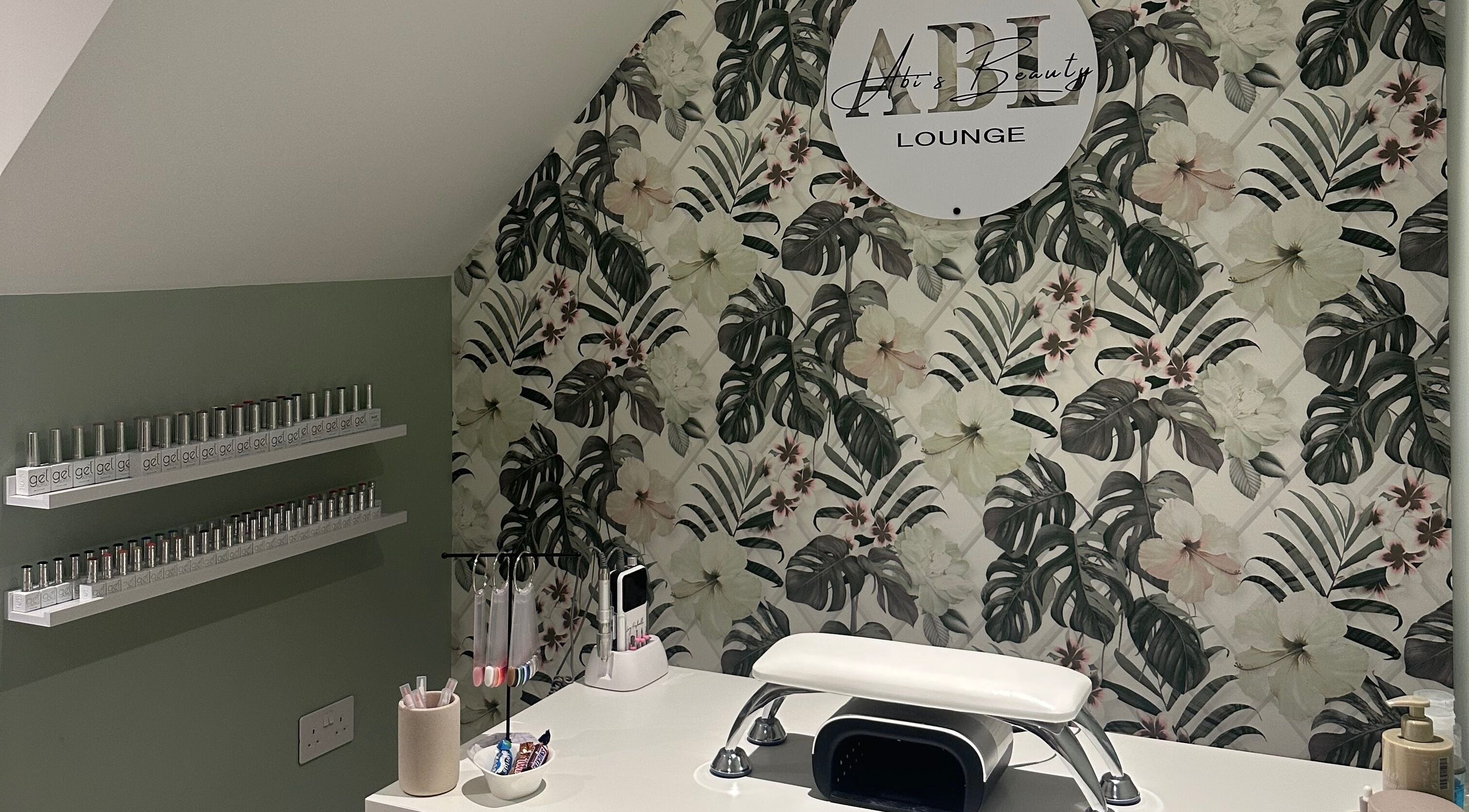 Abi’s Beauty Lounge manicure station with tropical decor in Great Ellingham, England, GB.