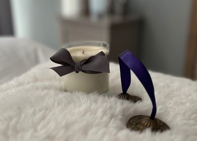 Relaxing candle and chimes at The Tranquility Skin Barn, Swainsthorpe, England, GB, enhancing the soothing ambiance.