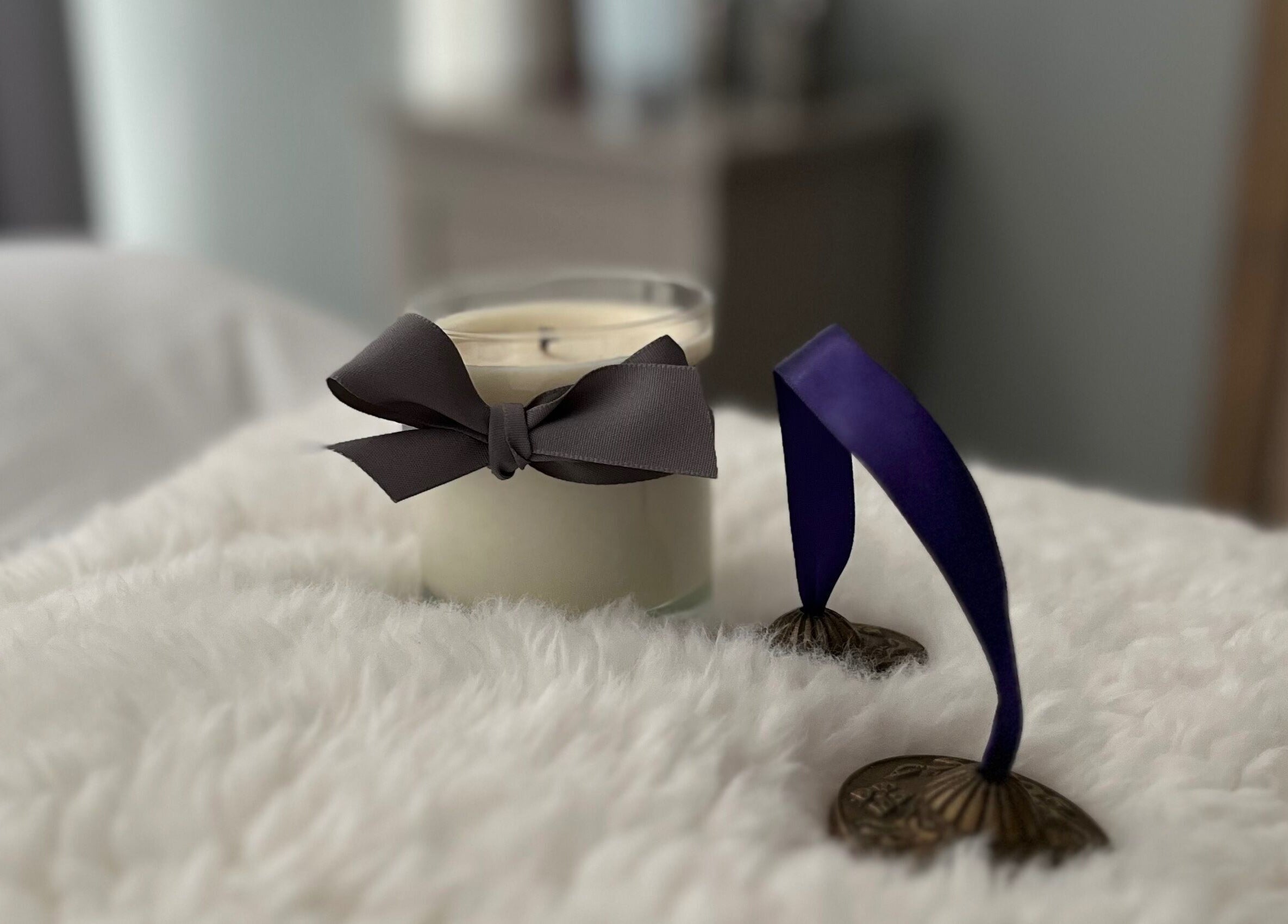 Relaxing candle and chimes at The Tranquility Skin Barn, Swainsthorpe, England, GB, enhancing the soothing ambiance.