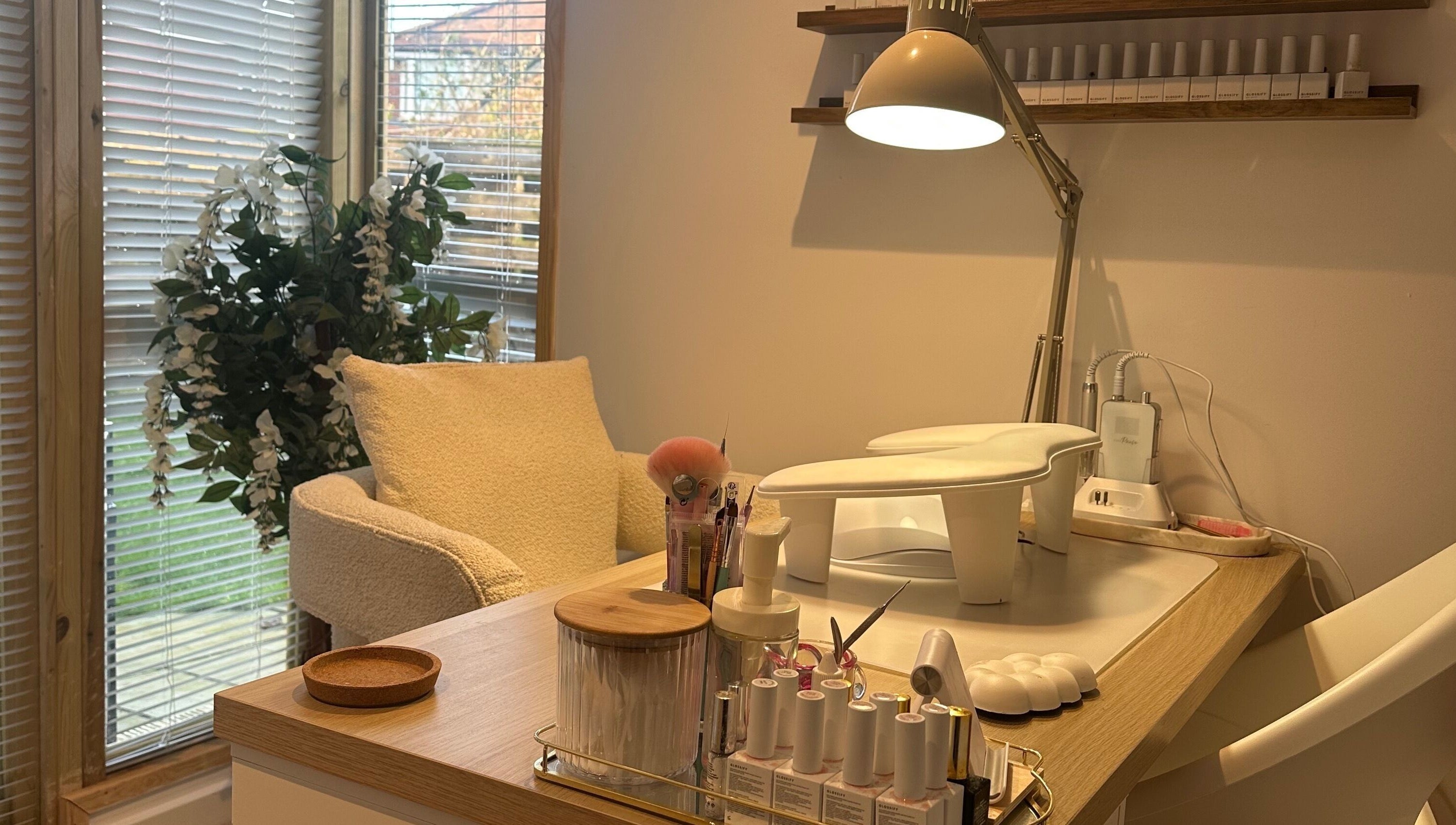 Cozy nail station at The Nail Studio - By Beth Rudd, York, England, GB, featuring elegant decor and manicure tools.