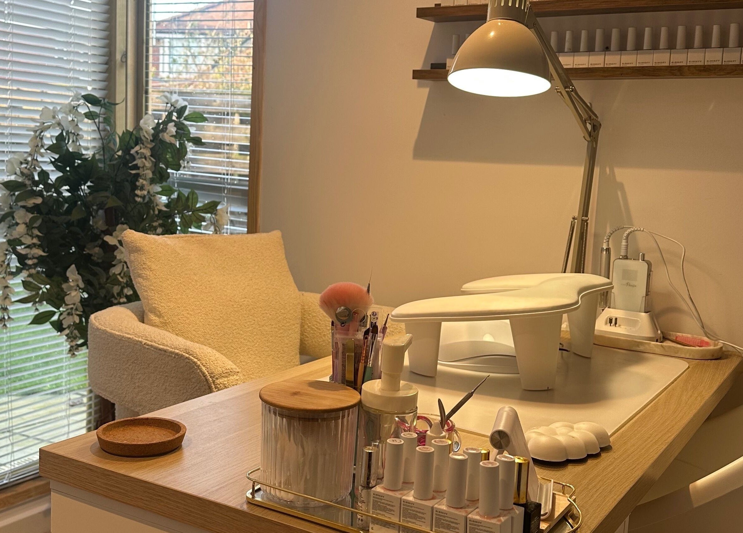 Cozy nail station at The Nail Studio - By Beth Rudd, York, England, GB, featuring elegant decor and manicure tools.