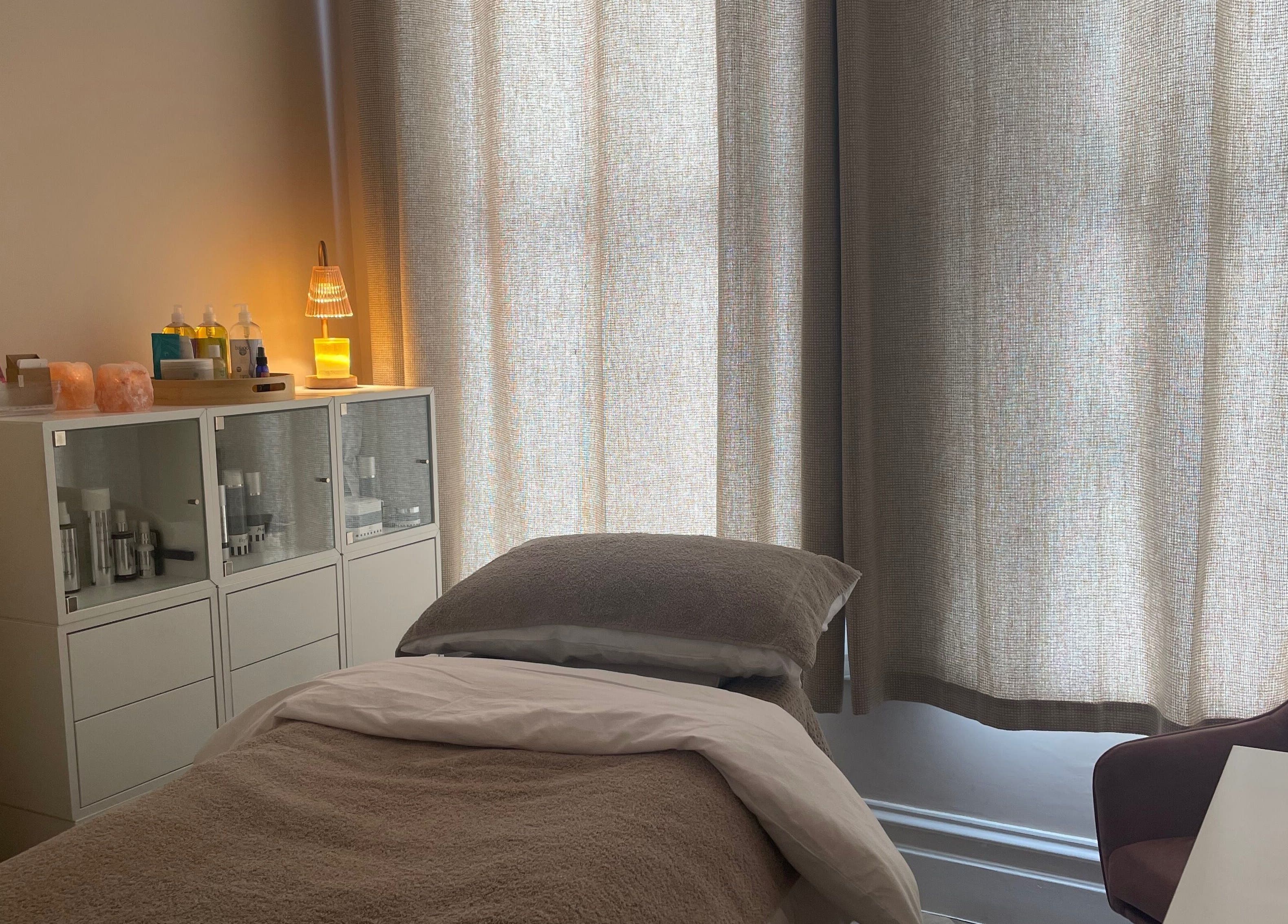Cozy treatment room at Peaceful Pamper with Lucy at AC Treatment Rooms, Broadstairs, England, GB, featuring soft lighting.