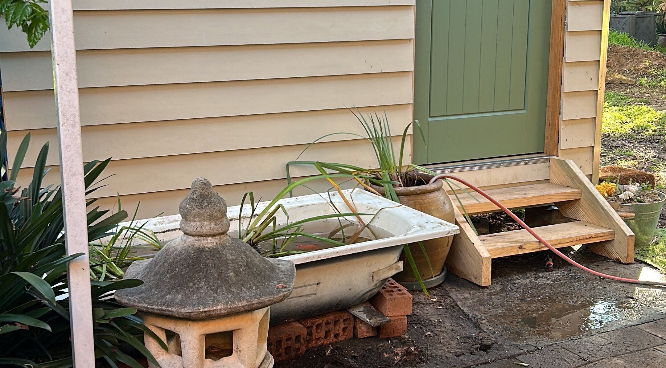 Calm garden entrance at Absolute Health and Harmony in Berkeley Vale, New South Wales, AU, highlighting tranquility.