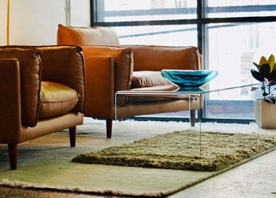 Elegant lounge at Abōde, featuring stylish armchairs and decor in Sydney, New South Wales, AU.