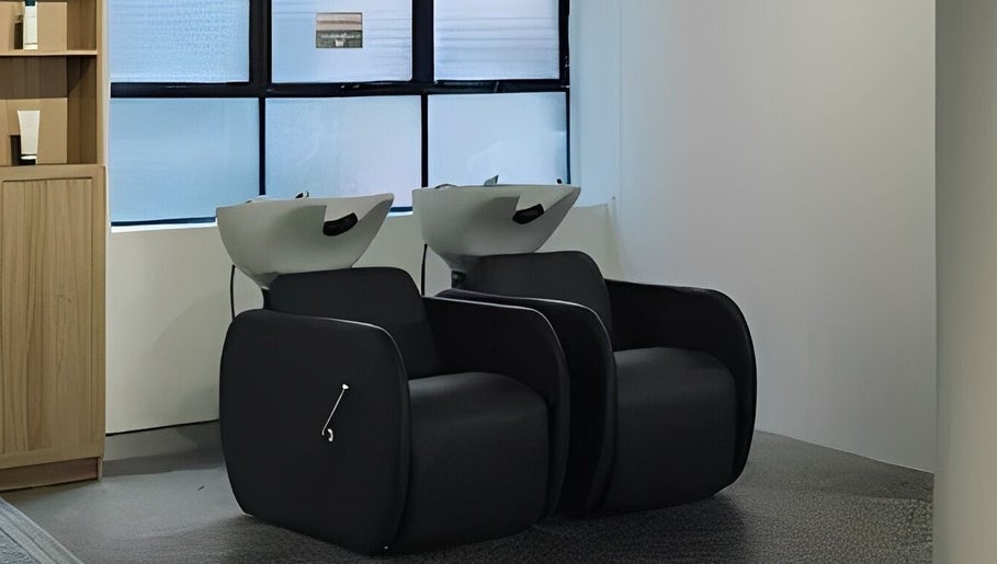 Elegant hair wash stations at Abōde in Sydney, New South Wales, AU, offering premium beauty and wellness services.