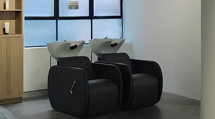 Elegant hair wash stations at Abōde in Sydney, New South Wales, AU, offering premium beauty and wellness services.