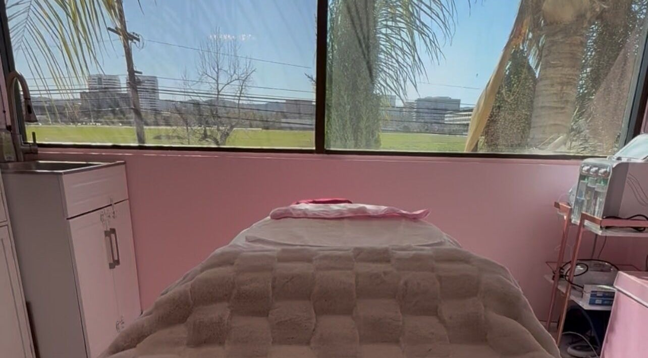 Relaxation therapy room at Fabulously Esthetics with Los Angeles view, California, US.