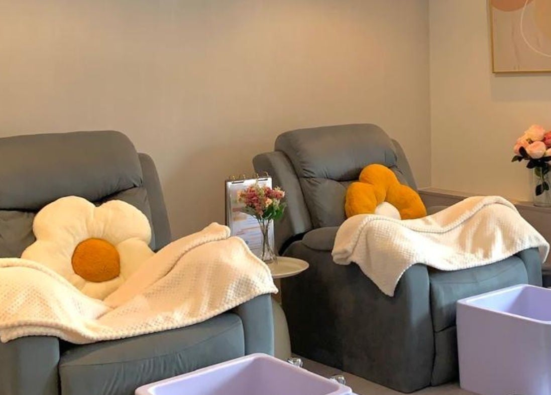 Relaxing spa chairs with floral pillows at Christine Nail Academy By Gaga& Co, Kuala Lumpur, Wilayah Persekutuan Kuala Lumpur, MY.