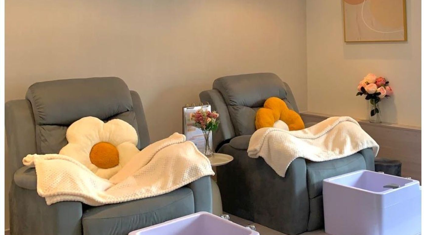 Relaxing spa chairs with floral pillows at Christine Nail Academy By Gaga& Co, Kuala Lumpur, Wilayah Persekutuan Kuala Lumpur, MY.