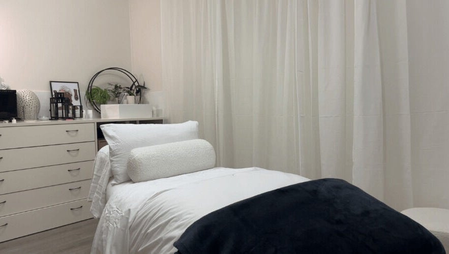 Relaxing room at Mira Skin, Warrnambool, Victoria, AU featuring cozy bed and soothing decor.