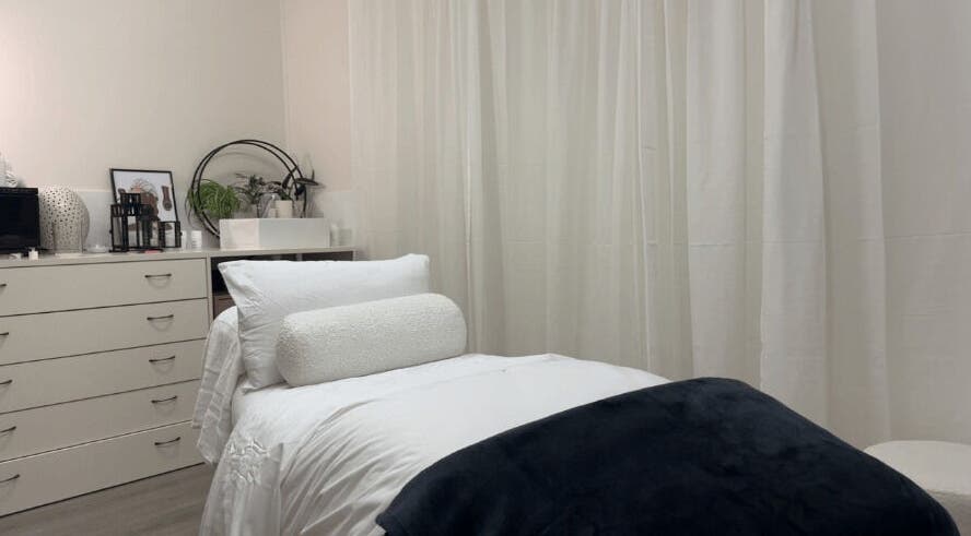 Relaxing room at Mira Skin, Warrnambool, Victoria, AU featuring cozy bed and soothing decor.