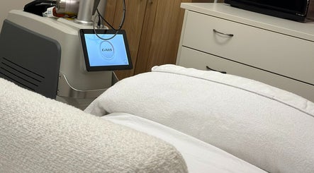 Mira Skin's advanced therapy room in Warrnambool, Victoria, AU featuring a sleek treatment machine.