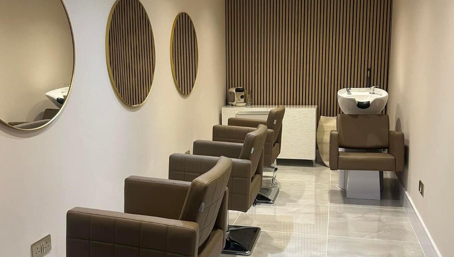 Modern salon chairs and mirrors at Hairworks, Newcastle upon Tyne, England, GB.