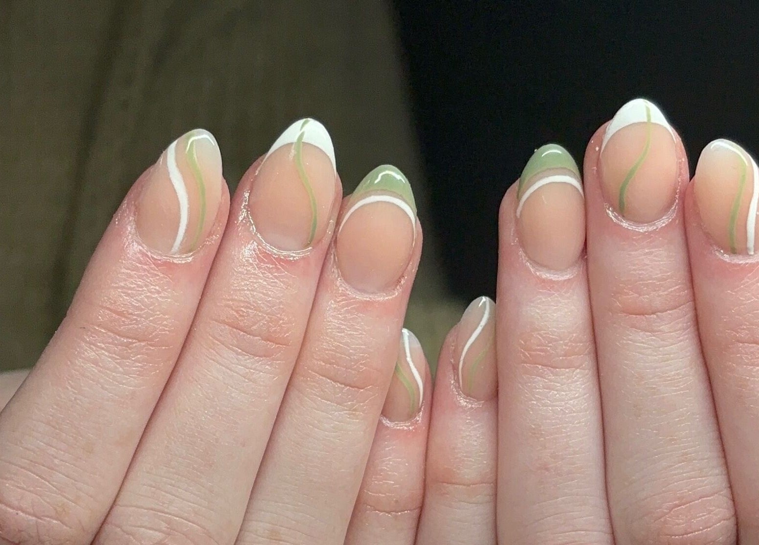 Elegant green and white swirl nails at Nails by Lola, Royal Wootton Bassett, England, GB.