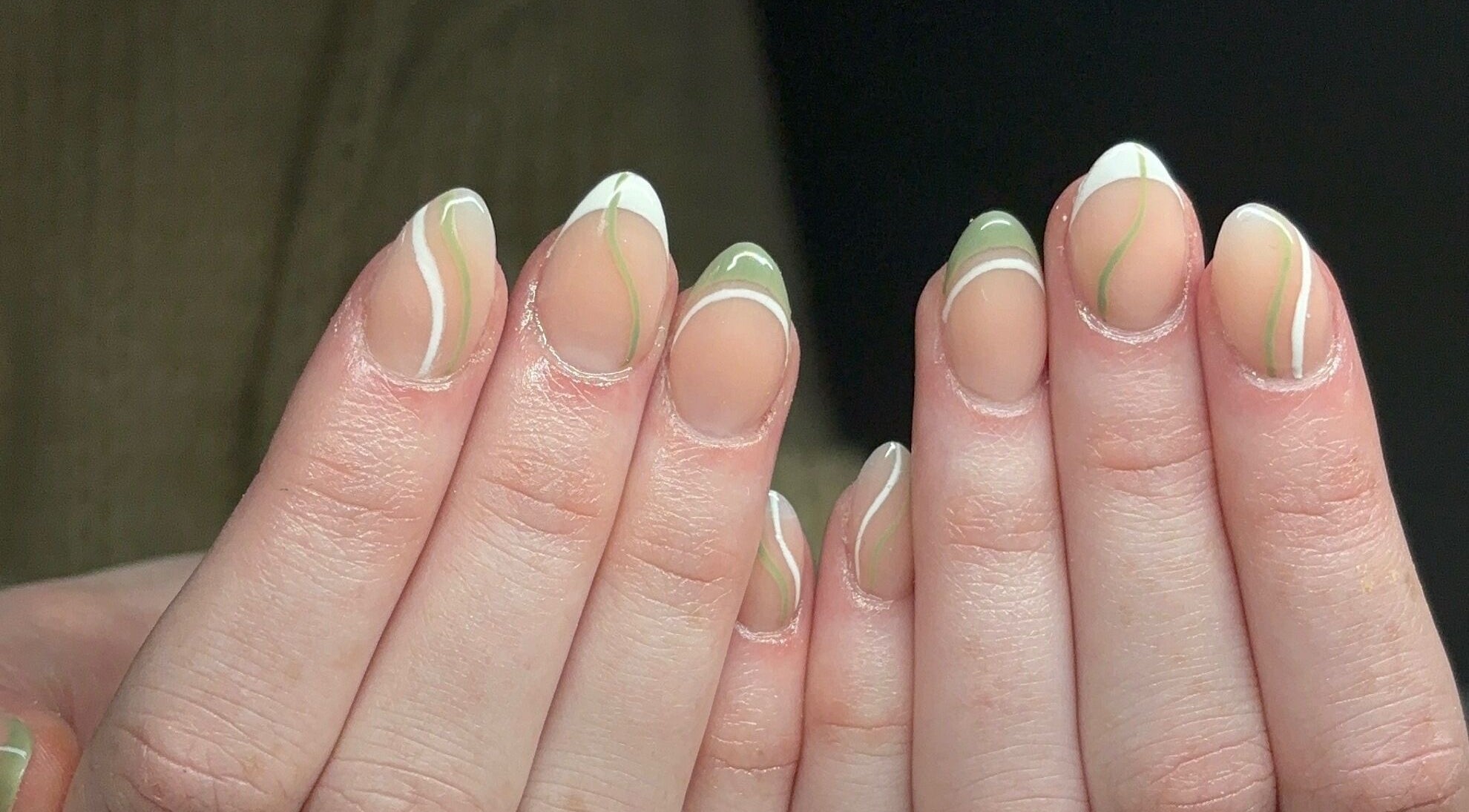 Elegant green and white swirl nails at Nails by Lola, Royal Wootton Bassett, England, GB.