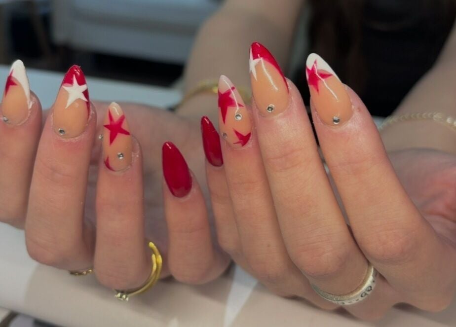 Red and white star nail art by Nails by Lola in Royal Wootton Bassett, England, GB.