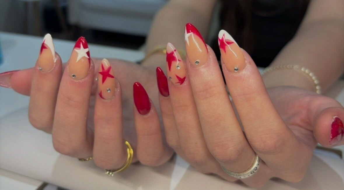 Red and white star nail art by Nails by Lola in Royal Wootton Bassett, England, GB.