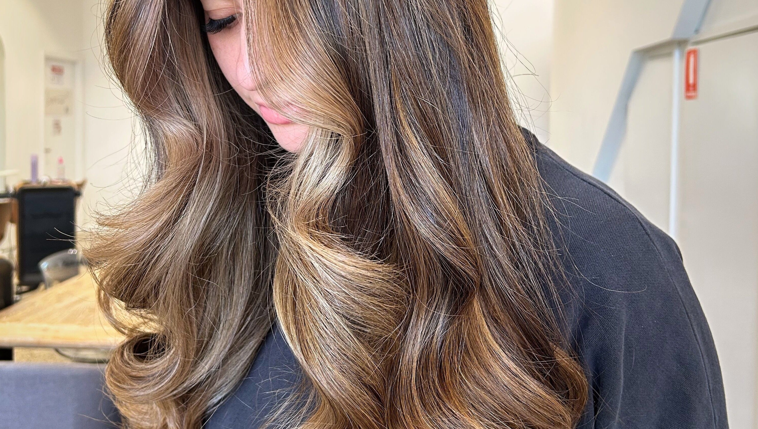Silky brown hair waves styled at Hope at The Studio, Castle Hill, New South Wales, AU.