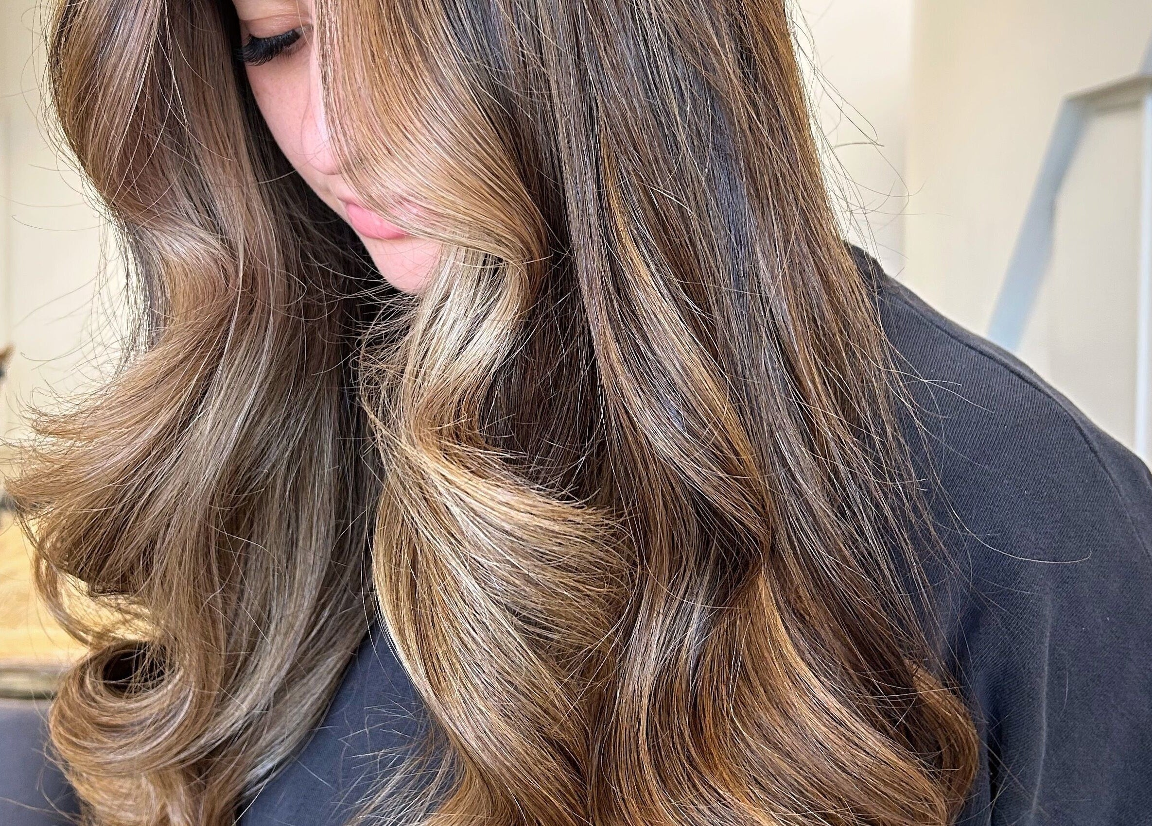 Silky brown hair waves styled at Hope at The Studio, Castle Hill, New South Wales, AU.