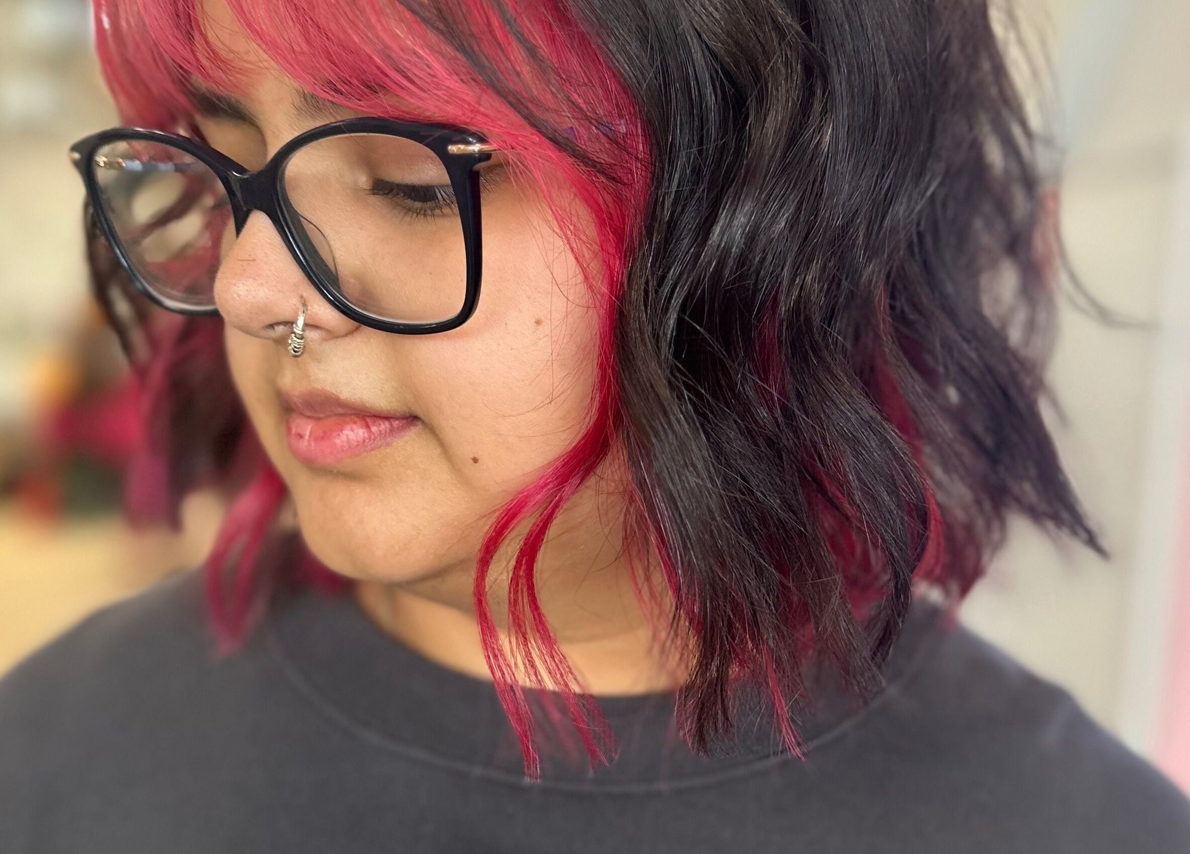 Woman with vibrant pink and black hair at Hope at The Studio, Castle Hill, New South Wales, AU.