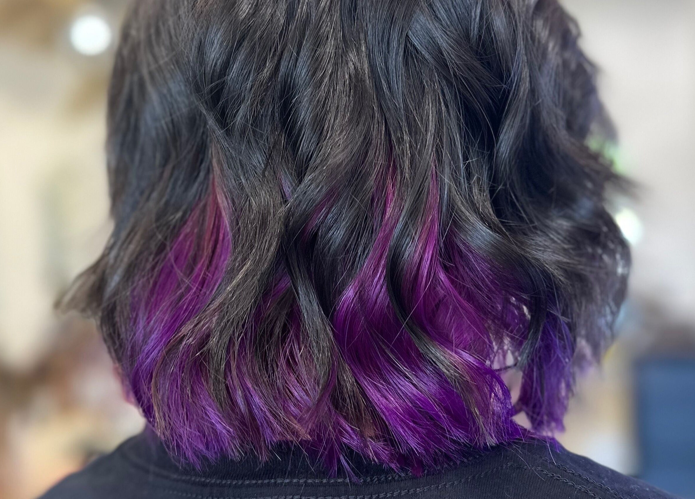 Chic black hair with purple tips styled at Hope at The Studio, Castle Hill, New South Wales, AU.