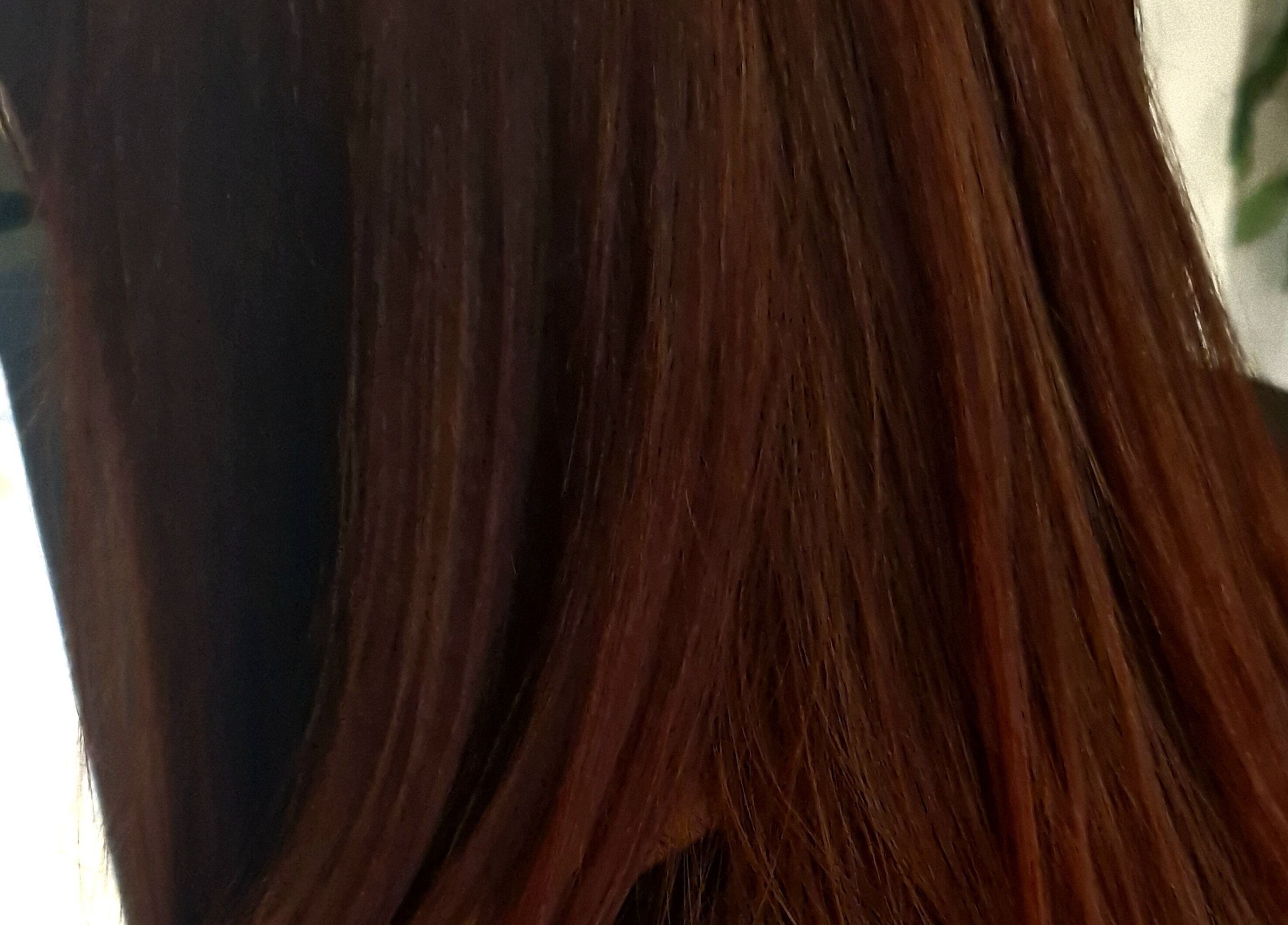 Smooth, sleek brown hair at BeeUnique in Northampton, England, GB.