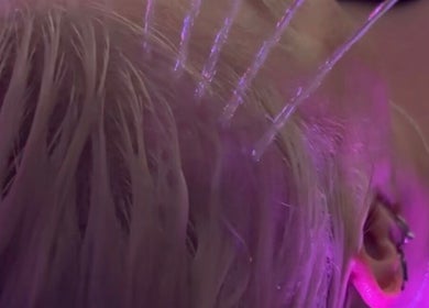 Relaxing hydrotherapy at The Allure Body Contouring in Adelaide, South Australia with soothing purple lighting.