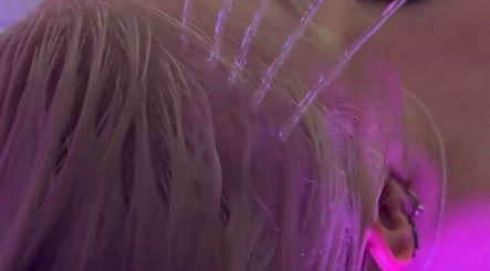 Relaxing hydrotherapy at The Allure Body Contouring in Adelaide, South Australia with soothing purple lighting.