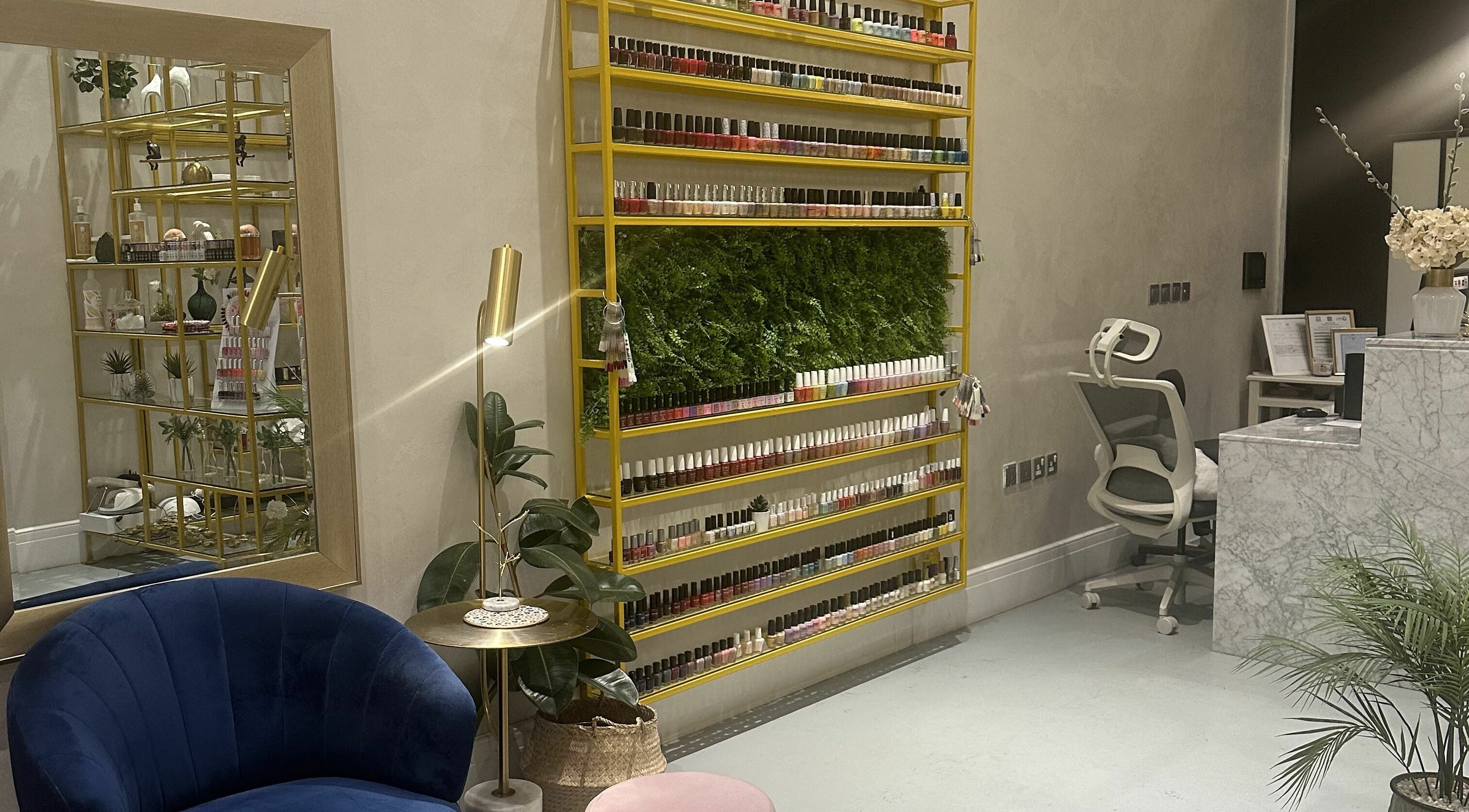 Elegant Naqa Nails interior showcasing colorful polish in Diriyah, Riyadh Province, SA.