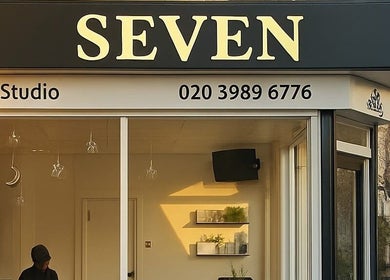 SEVEN Hair Studio exterior with bold signage in London, England, GB.