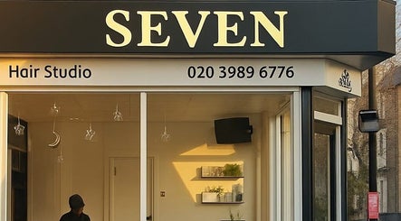 SEVEN Hair Studio exterior with bold signage in London, England, GB.