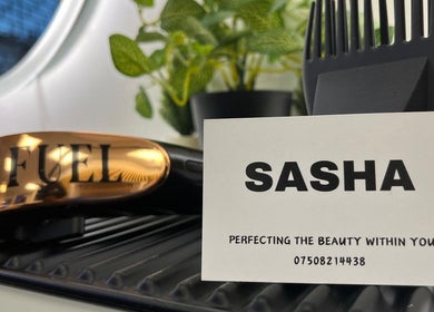 SEVEN Hair Studio, London, England, GB: Stylish clippers and plant on display create a modern salon vibe.