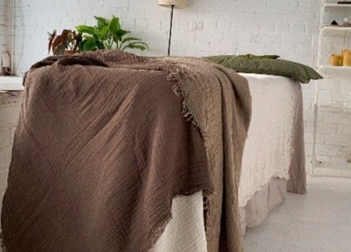 A tranquil spa room at The Tides, Leeds, GB with plush decor and soothing atmosphere, ideal for relaxation.