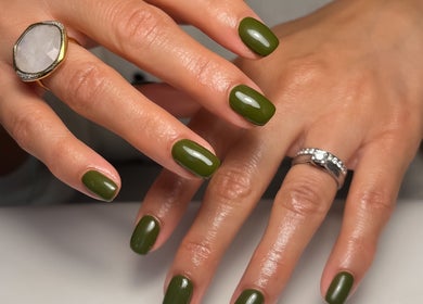 Stylish olive green manicure at Fleur’s Nails MK in Milton Keynes, England, GB showcasing elegance.