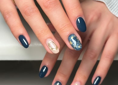 Stylish blue and gold nail art at Fleur’s Nails MK, Milton Keynes, England, GB.