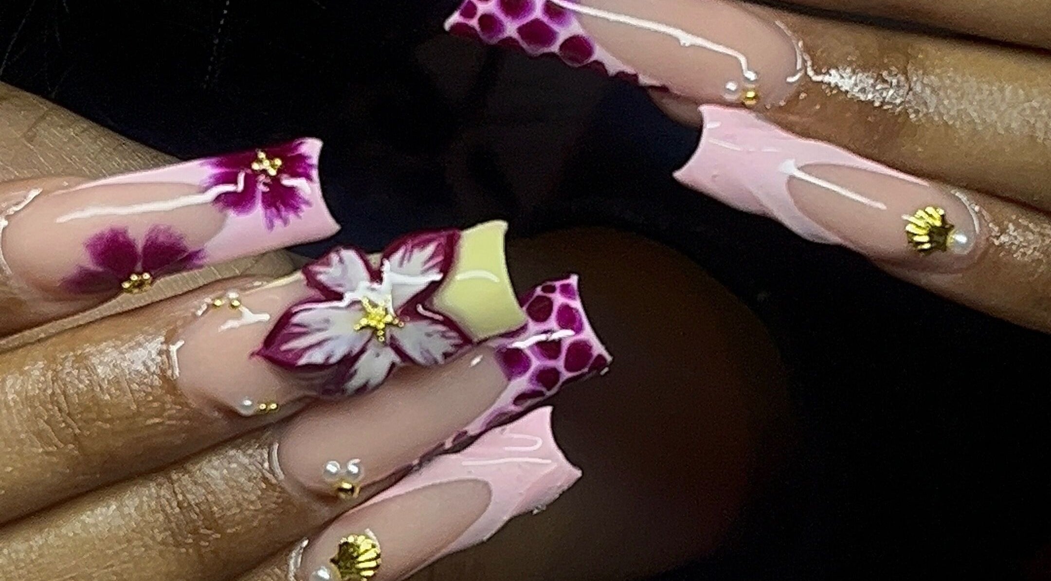 Detailed floral nail art by Nailsbykay in Centurion, Gauteng, ZA showcasing intricate designs and vibrant colors.