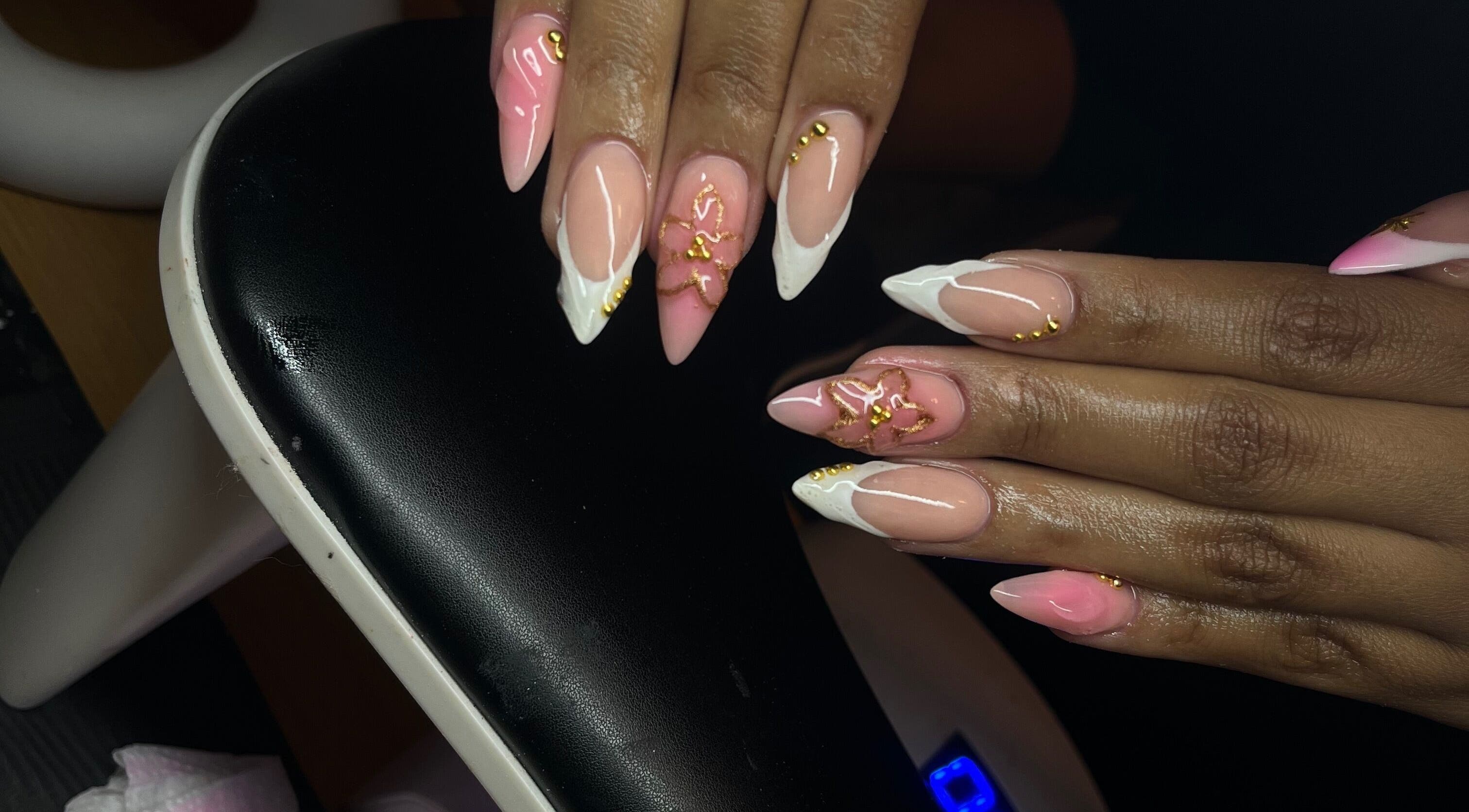 Elegant pink and white nail artistry at Nailsbykay in Centurion, Gauteng, ZA showcasing gold detailing.