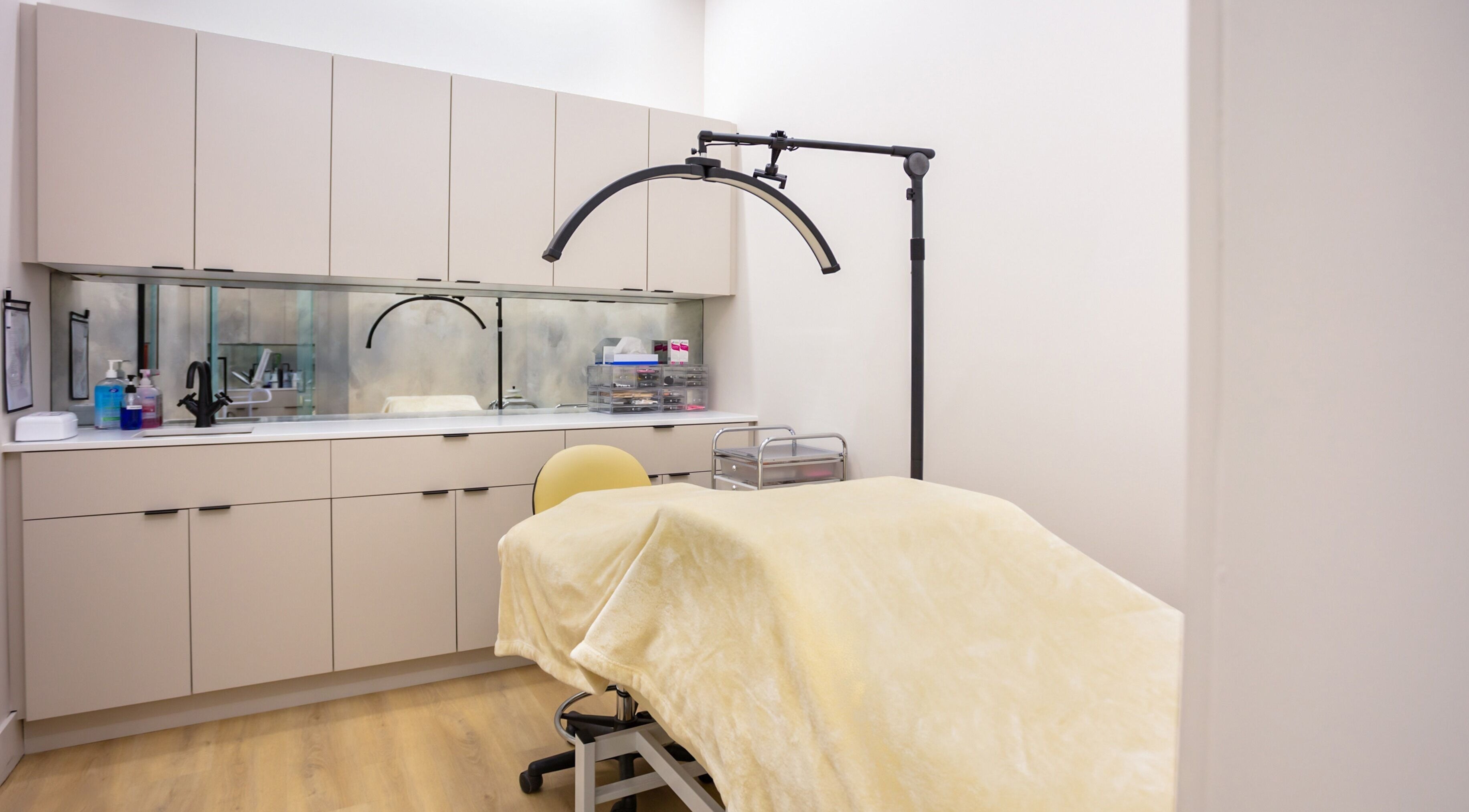 Modern treatment room at My Beautique Inc., Woodbridge, Ontario, CA, featuring a comfortable spa bed.