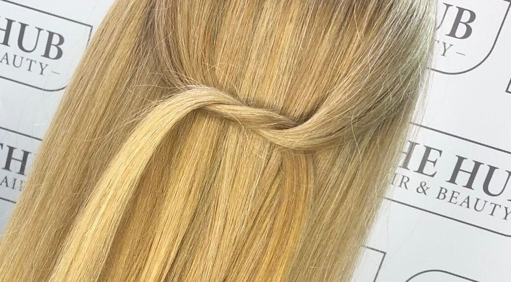 Blonde hair styled with a twist at The Hub Hair and Beauty, Sunderland, England, GB.