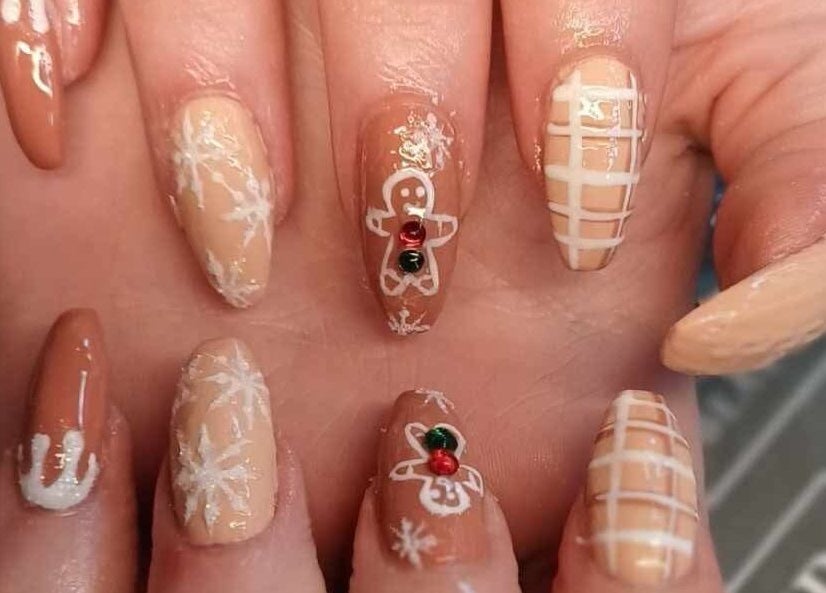 Festive nail art with gingerbread design at The Hub Hair and Beauty, Sunderland, England, GB.