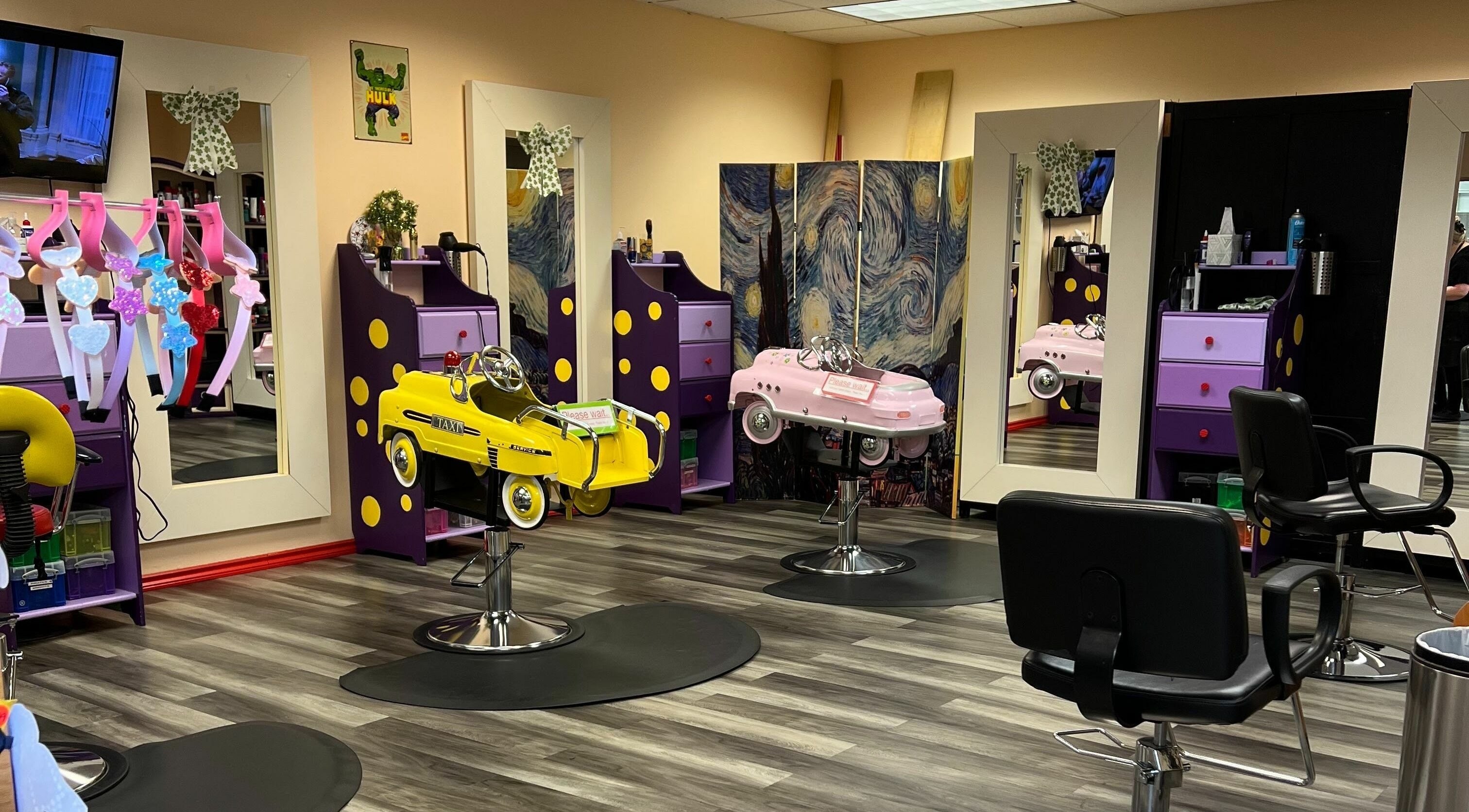 Kids Cutz salon in Bellevue, Washington, features vibrant kid-friendly seating and playful decor.