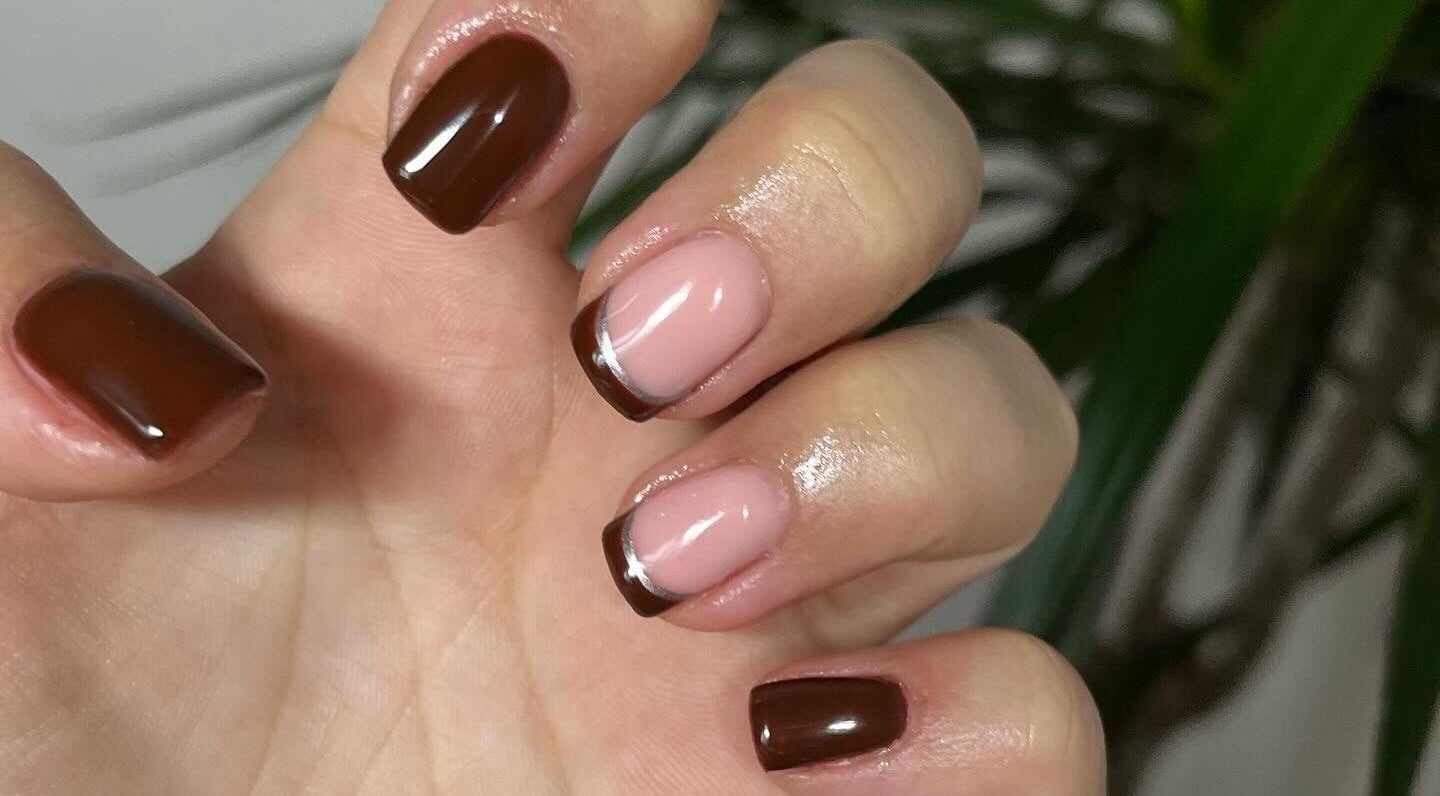 Elegant brown and pink French manicure at Clos Beauty, Peterborough, England, GB.