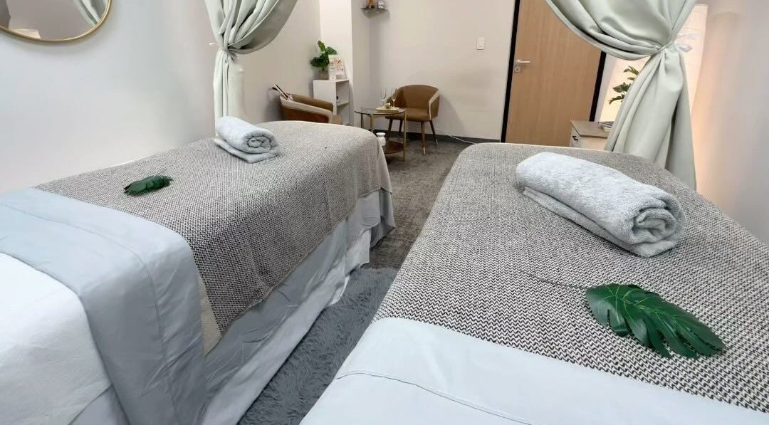 Tranquil massage room at Union Spa NYC, featuring two cozy beds, New York, New York, US.