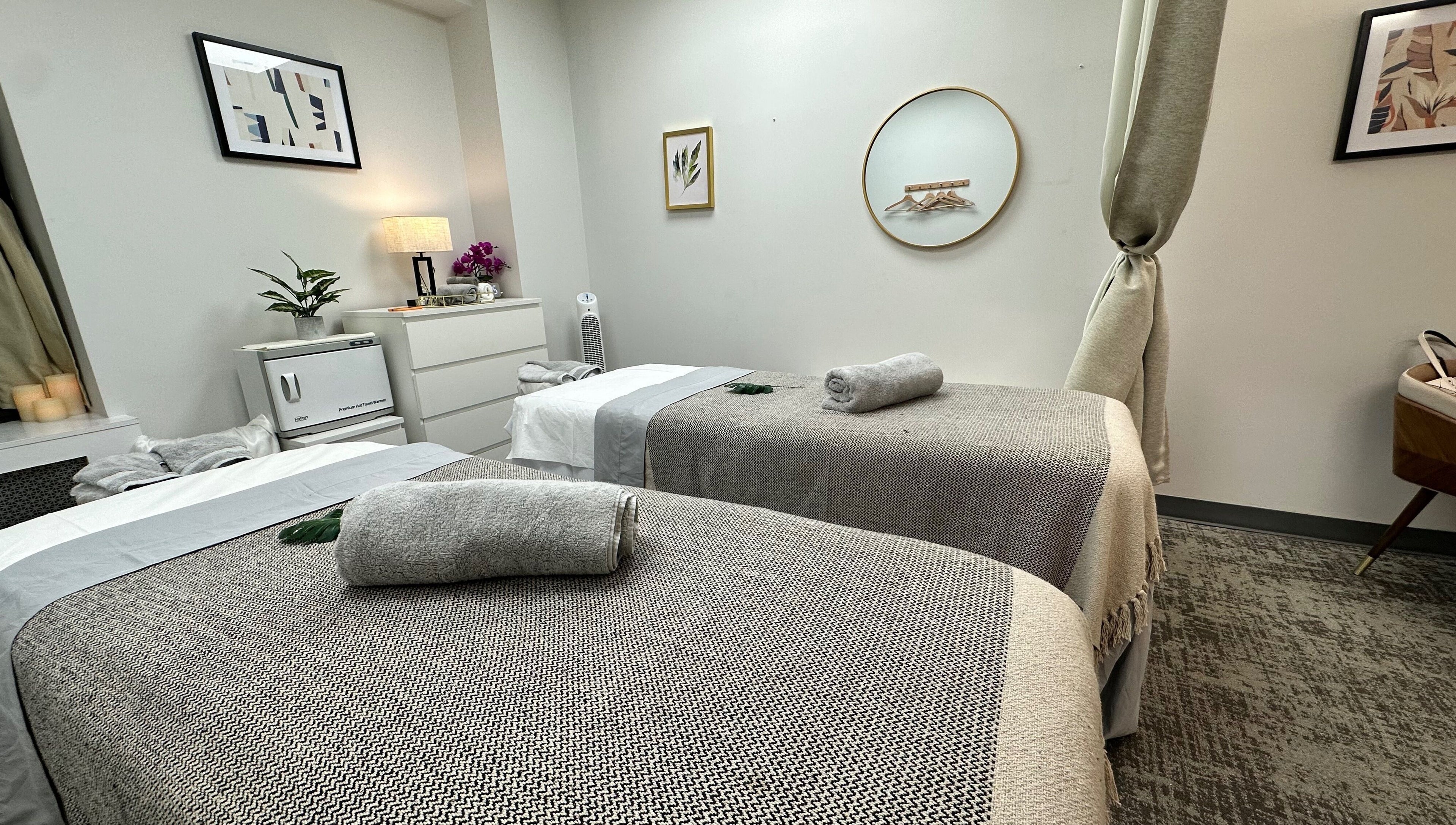 Serene spa room with massage tables at Union Thai Spa, New York, New York, US, offering ultimate relaxation.