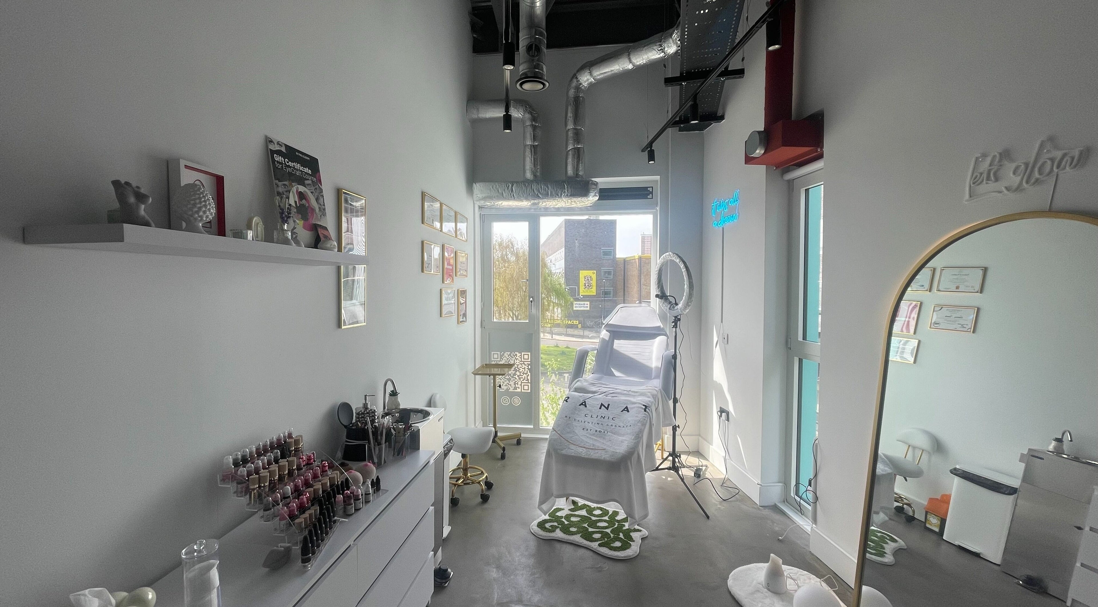 The Granata Clinic's modern treatment room in London, England, GB, featuring sleek decor and professional equipment.