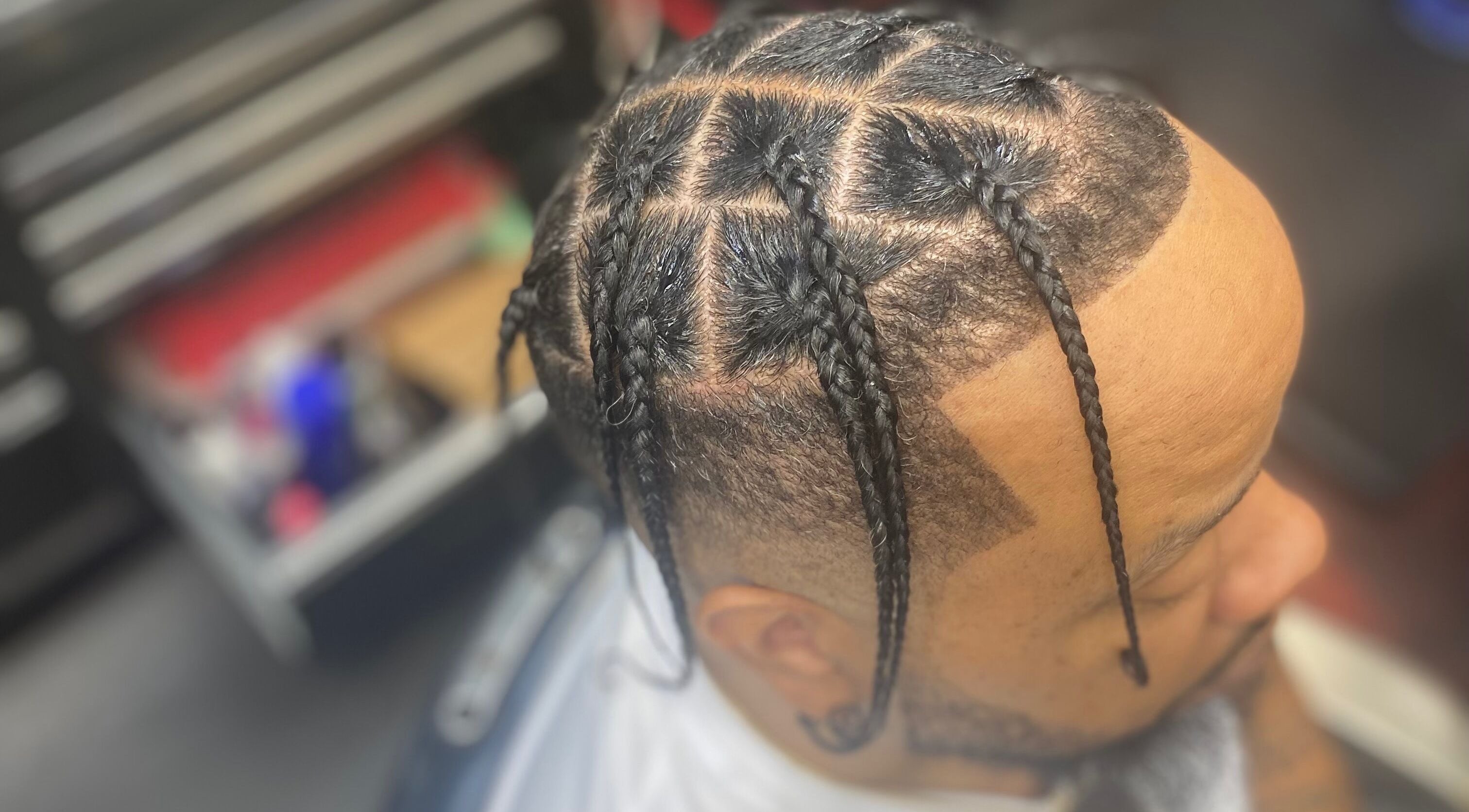 Close-up of intricate braided hairstyle at Vanity Bratz, Atlanta, Georgia, US. Expert styling for modern fashion.