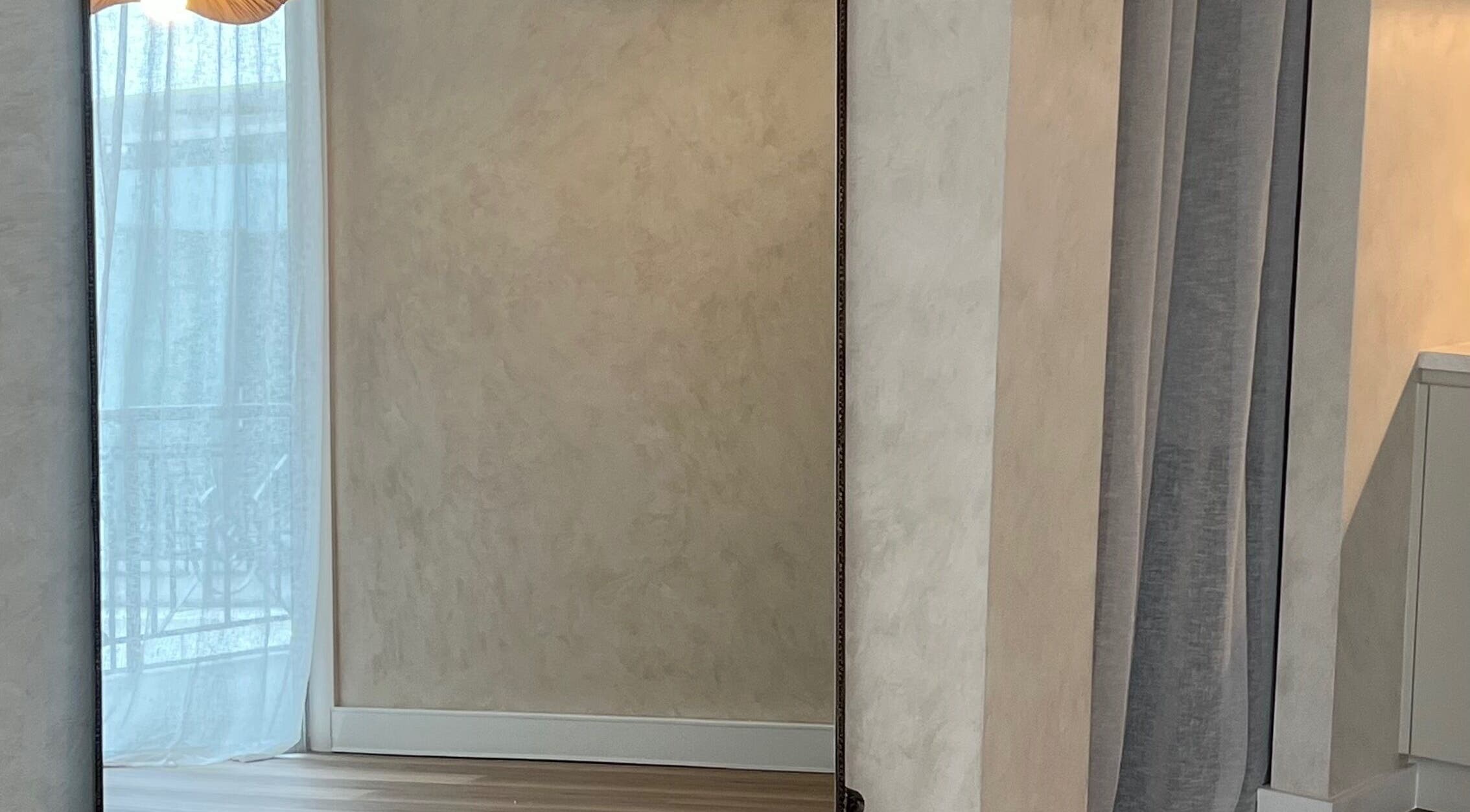 Elegant mirror and soft drapes in Hasana salon, Griffith, Australian Capital Territory, AU.