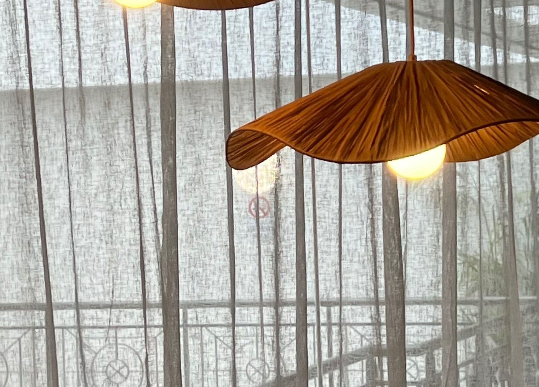 Warm, elegant lighting fixture at Hasana in Griffith, Australian Capital Territory, AU exuding a tranquil ambiance.