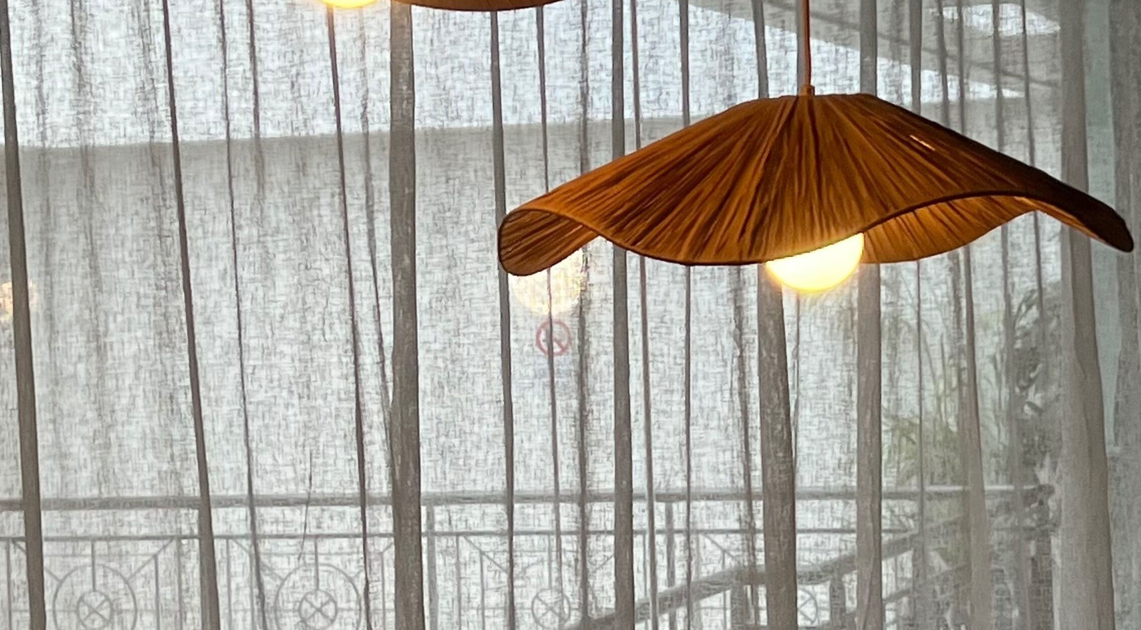 Warm, elegant lighting fixture at Hasana in Griffith, Australian Capital Territory, AU exuding a tranquil ambiance.